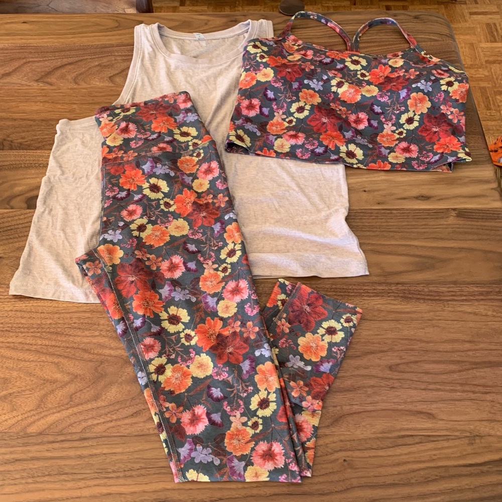 Beyond Yoga floral pants and matching racerback cropped tank.